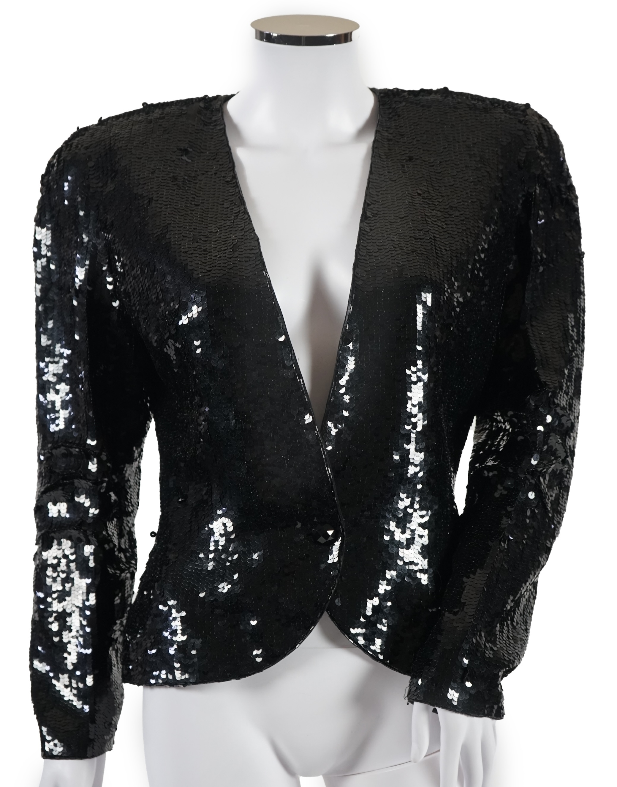 A selection of lady's evening tops and jackets, all black with sequin embellishments, six pieces in total. Proceeds to Happy Paws Puppy Rescue